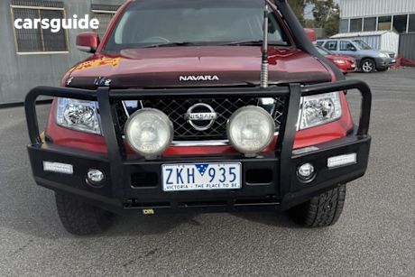 Red 2012 Nissan Navara Dual Cab Pick-up St (4X4)