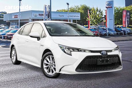 White 2021 Toyota Corolla Sedan ASCENT SPORT HYBRID F