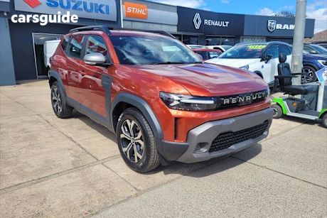 Orange 2025 Renault Duster SUV Evolution