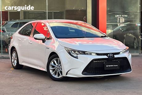White 2022 Toyota Corolla Sedan ASCENT SPORT HYBRID F