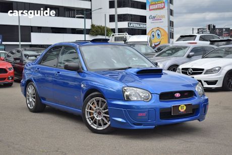 Blue 2004 Subaru Impreza Sedan WRX STI 4WD