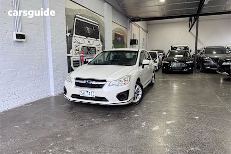 White 2014 Subaru Impreza Hatchback 2.0I (Awd)