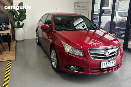 Red 2011 Holden Cruze Sedan CDX F