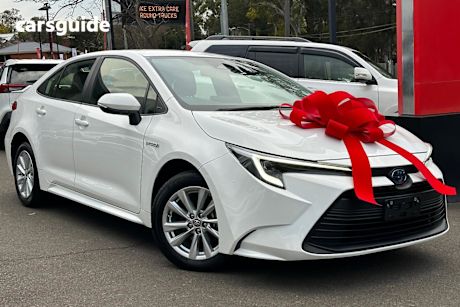 White 2024 Toyota Corolla Sedan ASCENT SPORT HYBRID F