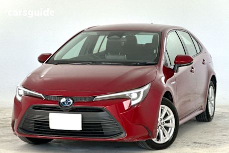 Red 2024 Toyota Corolla Sedan ASCENT SPORT HYBRID F