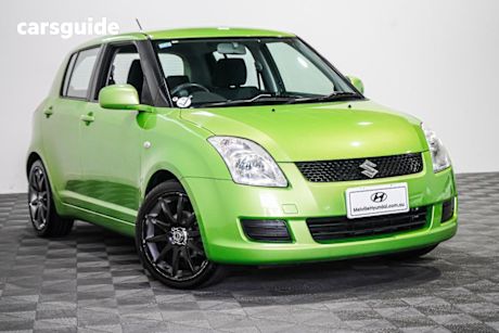 Green 2010 Suzuki Swift Hatchback