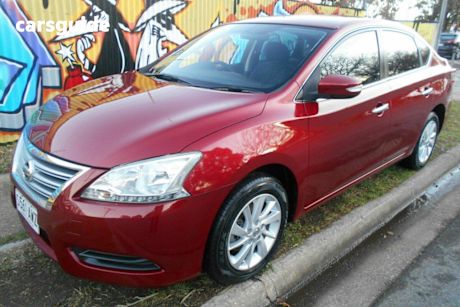 Red 2013 Nissan Pulsar Sedan St-L