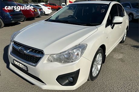 White 2012 Subaru Impreza Sedan 2.0I-L (Awd)