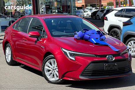 Red 2023 Toyota Corolla Sedan ASCENT SPORT HYBRID F
