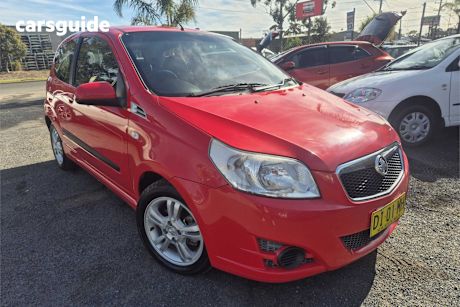 Red 2010 Holden Barina Hatchback