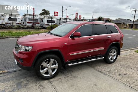Red 2011 Jeep Grand Cherokee SUV OVERLAND 4X4