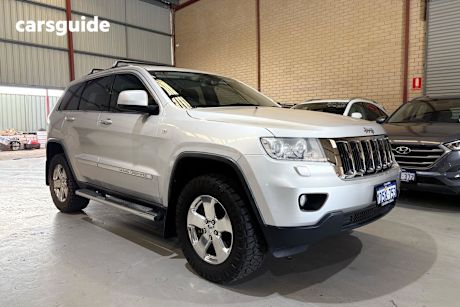 Silver 2011 Jeep Grand Cherokee SUV LAREDO 4X4