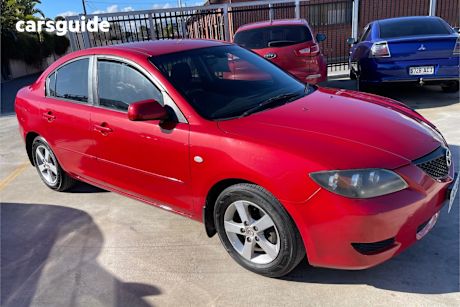 Red 2006 Mazda 3 Sedan Maxx