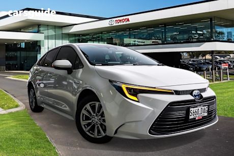 White 2023 Toyota Corolla Sedan SX HYBRID F