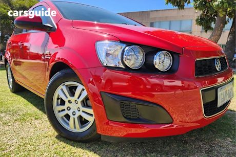 Red 2015 Holden Barina Sedan Cd