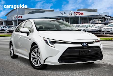White 2023 Toyota Corolla Sedan ASCENT SPORT HYBRID F