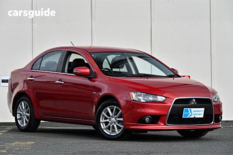 Red 2014 Mitsubishi Lancer Sedan LS F