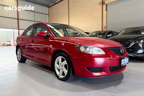 Red 2006 Mazda Mazda3 Sedan MAXX F
