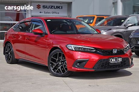Red 2023 Honda Civic Hatch E:HEV LX F