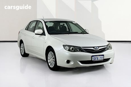 White 2010 Subaru Impreza Sedan R (Awd)