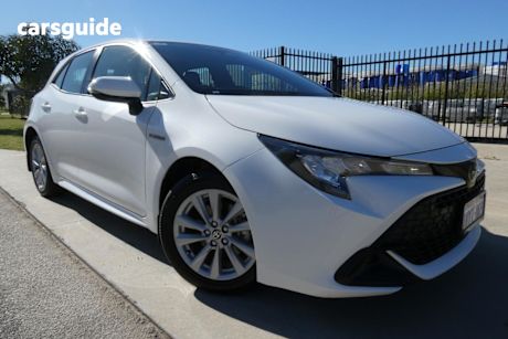 White 2023 Toyota Corolla Hatchback Ascent Sport Hybrid