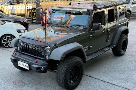 Green 2015 Jeep Wrangler Sedan UNLIMITED SPORT 4X4