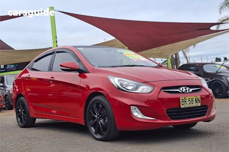 Red 2012 Hyundai Accent Sedan Premium