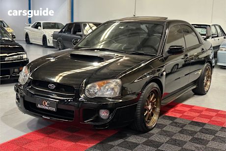 Black 2004 Subaru Impreza Sedan Wrx Club Spec Evo 7