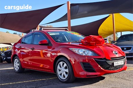 Red 2010 Mazda 3 Sedan Neo