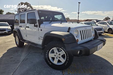 White 2011 Jeep Wrangler Softtop Unlimited Sport (4X4)