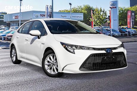 White 2021 Toyota Corolla Sedan ASCENT SPORT HYBRID F