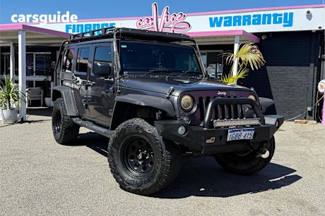 Grey 2015 Jeep Wrangler Unlimited Softtop Sport (4X4)