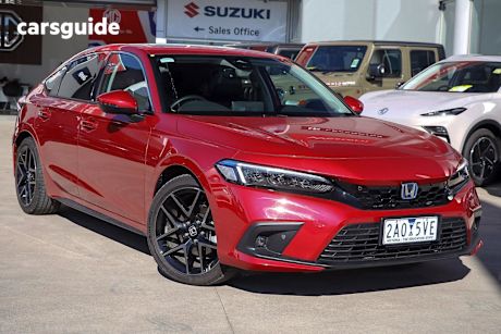 Red 2023 Honda Civic Hatch E:HEV LX F