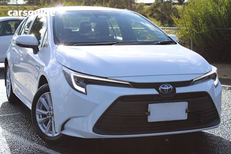 White 2023 Toyota Corolla Sedan ASCENT SPORT HYBRID F