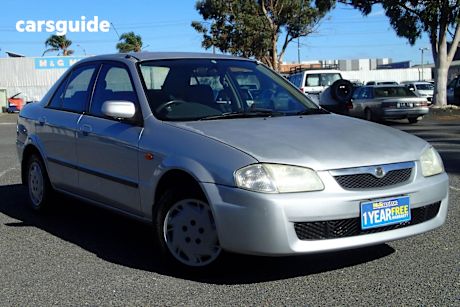 Silver 1999 Mazda 323 Sedan Protege