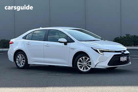 White 2024 Toyota Corolla Sedan ASCENT SPORT HYBRID F