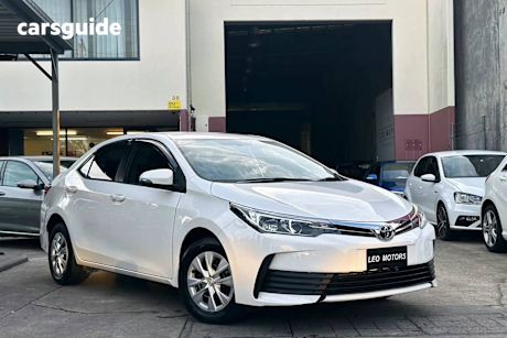 White 2019 Toyota Corolla Sedan Ascent