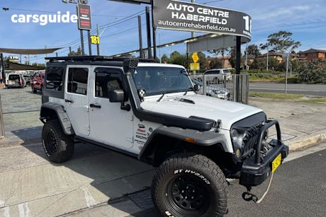 White 2014 Jeep Wrangler Sedan UNLIMITED SPORT 4X4
