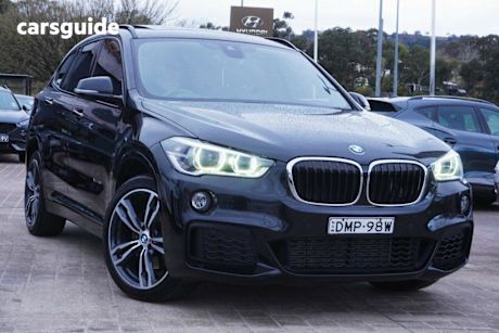 Black 2016 BMW X1 SUV XDRIVE25I 4WD