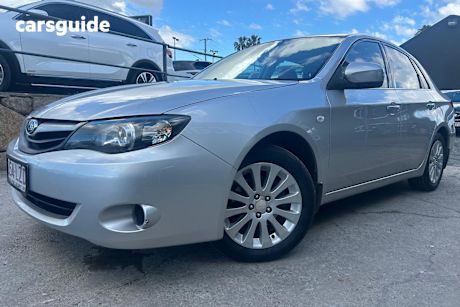 Silver 2009 Subaru Impreza Sedan R 4WD