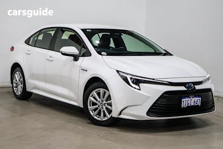 White 2024 Toyota Corolla Sedan ASCENT SPORT HYBRID F