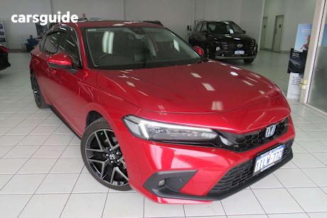 Red 2023 Honda Civic Hatch E:HEV LX F