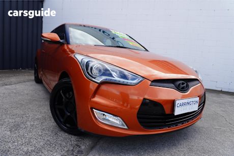 Orange 2012 Hyundai Veloster Coupe +