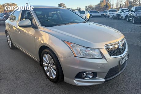 Gold 2011 Holden Cruze Sedan CDX F