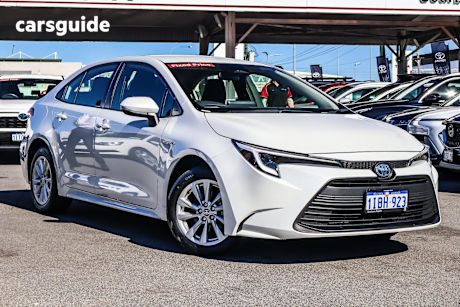 White 2023 Toyota Corolla Sedan ASCENT SPORT HYBRID F
