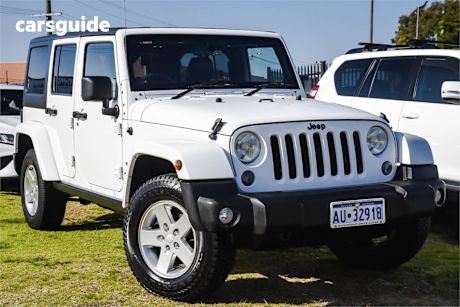 White 2014 Jeep Wrangler Sedan UNLIMITED FREEDOM 4X4