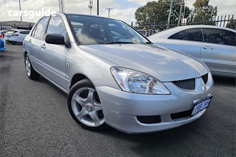 Silver 2006 Mitsubishi Lancer Sedan ES F
