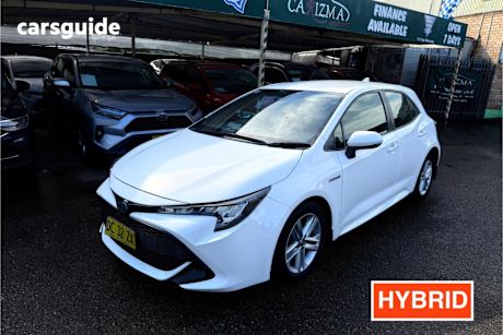 White 2021 Toyota Corolla Hatchback Ascent Sport Hybrid