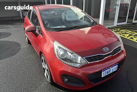 Red 2011 Kia RIO Hatch SLI