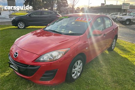 Red 2010 Mazda 3 Sedan Neo